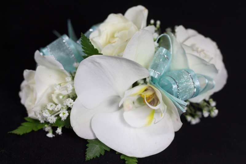 White and baby blue corsage